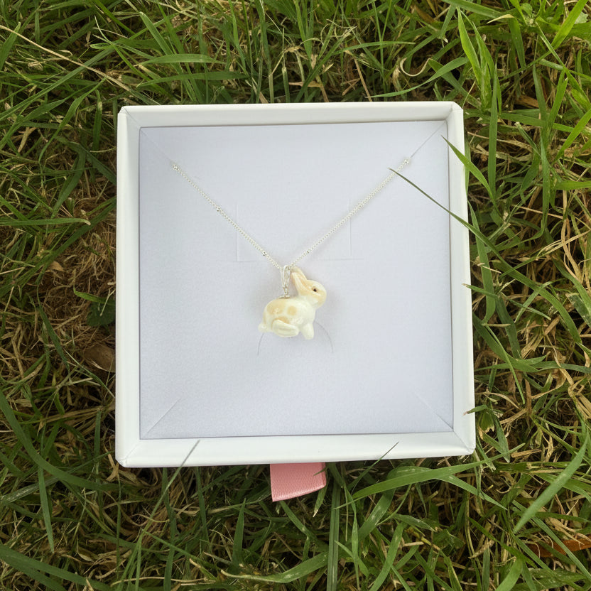 Blonde spotted rabbit necklace