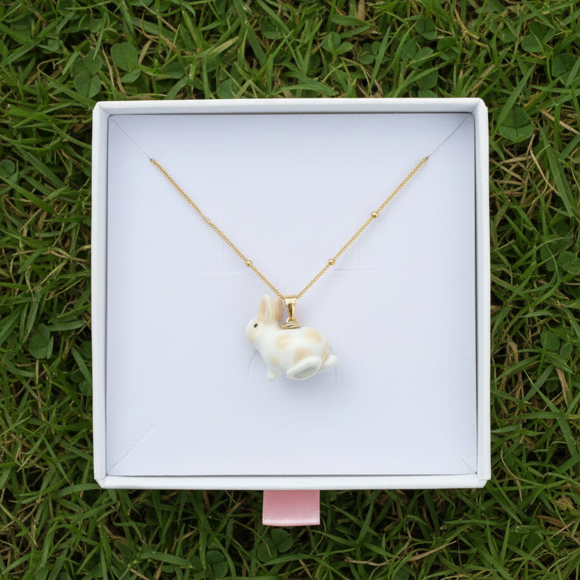 Blonde spotted rabbit necklace