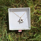 Black and white cow necklace