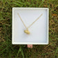 Blonde guinea pig necklace