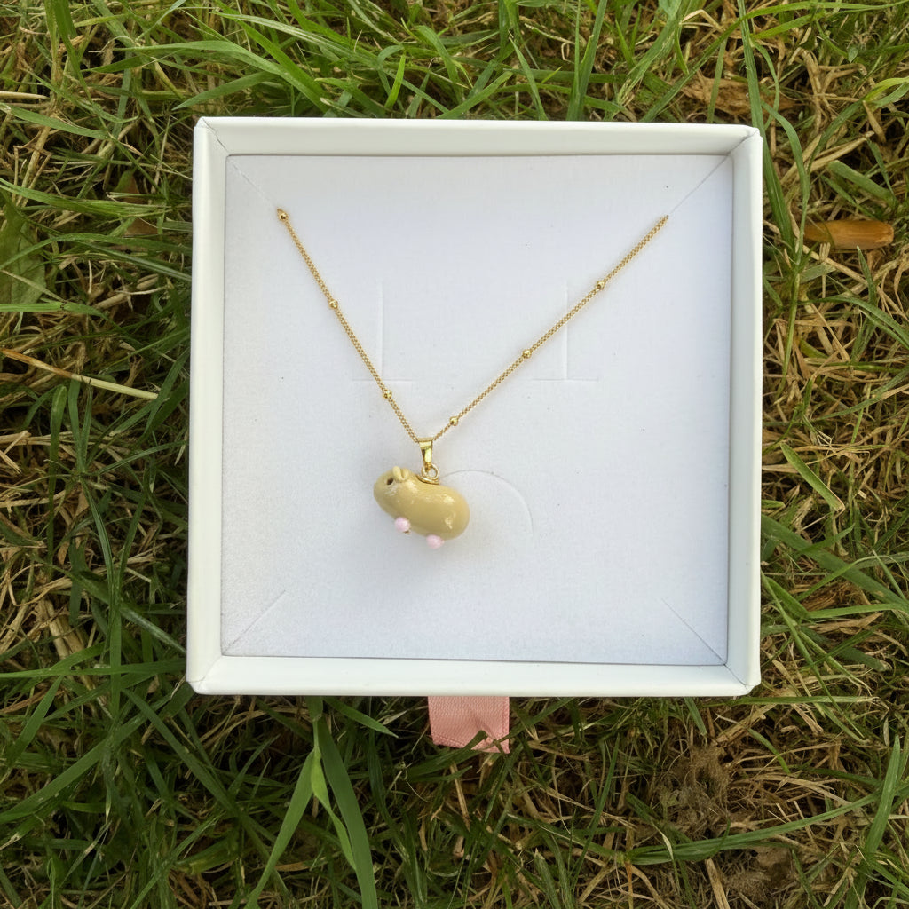 Blonde guinea pig necklace